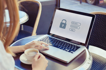 data protection and internet security concept, woman user typing password on computer for secured access