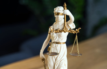 Poster - Law and Justice concept. Gavel of the judge, books, scales of justice. Gray stone background.