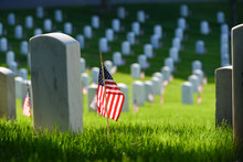 Arlington National Cemetery - Headstones And U.S. National Flags - Circa Washington D.C. United States Of America