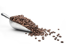 Spoon Coffee Scoop And Coffee Beans Roasted On A White Background With Copy Space For Your Text