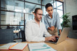© Drobot Dean - Photo of multinational serious colleagues discussing project