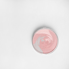 Wall Mural - makeup Highlighter (powder illuminator) on white background; vanity concept