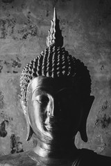 Beautiful Golden buddha statue in Sitting post with black and white style