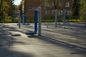 Empty street exercise machines in a public place. The concept of ban on walking.