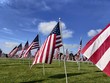 american flag flying wind memorial veterans usa