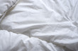 © Volkova Evgeniia - Texture of a white blanket.  Soft white bed linen. Background. Texture. Minimalism.