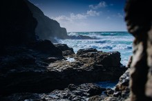 View Of A Rocky Shore With Ocean Waves