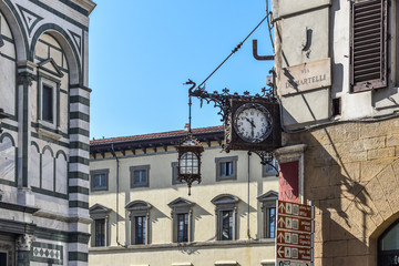 Wall Mural - A beautiful captured moment in time in  Florence Italy, European culture, clock and lantern