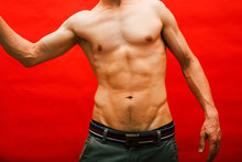 Man Standing Naked Torso Abc On Red Background, Lifestyle Sport People