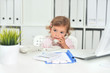 © aletia2011 - Cute little girl using phone in office