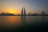 Fototapeta  -  The Bahrain World Trade Center during sunrise, a twin tower complex is the first skyscraper in the world to have wind turbines, photographed on January 20, 2017, Manama, Bahrain