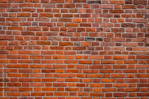 Photo Weathered red brick wall background, texture