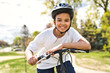 © Louis-Paul Photo - boy riding bike wearing a helmet outside