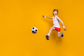 Sticker - Full length body size view of nice funky crazy overjoyed ecstatic glad excited cheerful cheery motivated guy jumping playing soccer isolated over bright vivid shine vibrant yellow color background