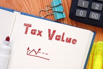 Business concept about Tax Value with sign on the sheet.