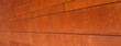 Rostige Hausfassade mit rost braunen Cor-Ten Stahl Platten. Rusty house facade of Cor-Ten steel panels.
