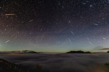 Wall Mural - Tai Wan meteor shower with sea of clouds night view scene