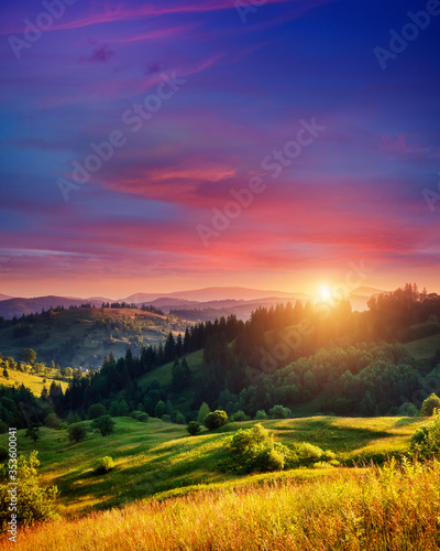 Fototapete - Summer sunset in mountains