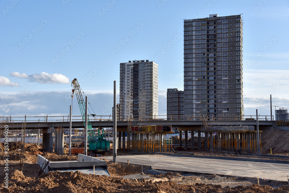 Roundabout and traffic bridge construction. Construction highway ramps ...