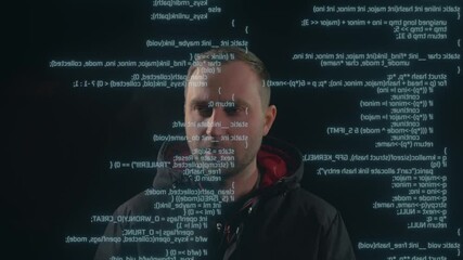 White man is looking on the code, script, text on the screen in front of him. Programming, cyber, digital concept. 