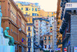 NAPLES, ITALY. Classical romantic small street with bronze statue in the historical center of Naples, 