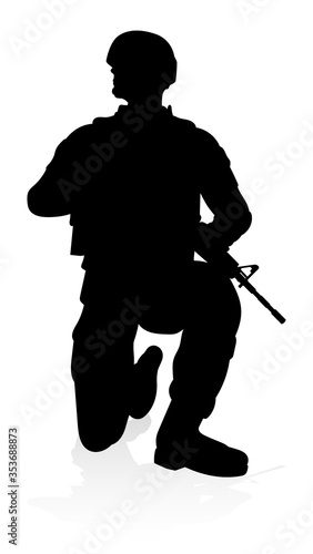 Silhouettes of a military a...