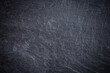 © ImagineDesign - Dark grey and black slate background or texture