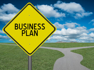 Business plan sign on road to success.