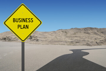 Business Plan sign with road in background.