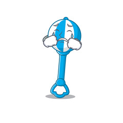 Sticker - Caricature design of rattle toy having a sad face