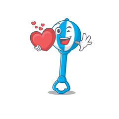 Wall Mural - A sweet rattle toy cartoon character style holding a big heart