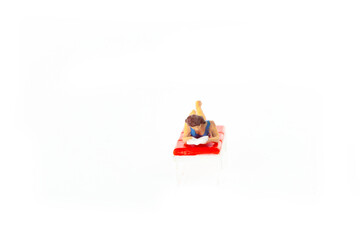 Wall Mural - Miniature people office, worker and swimming beach sport concept in variety action on white background 