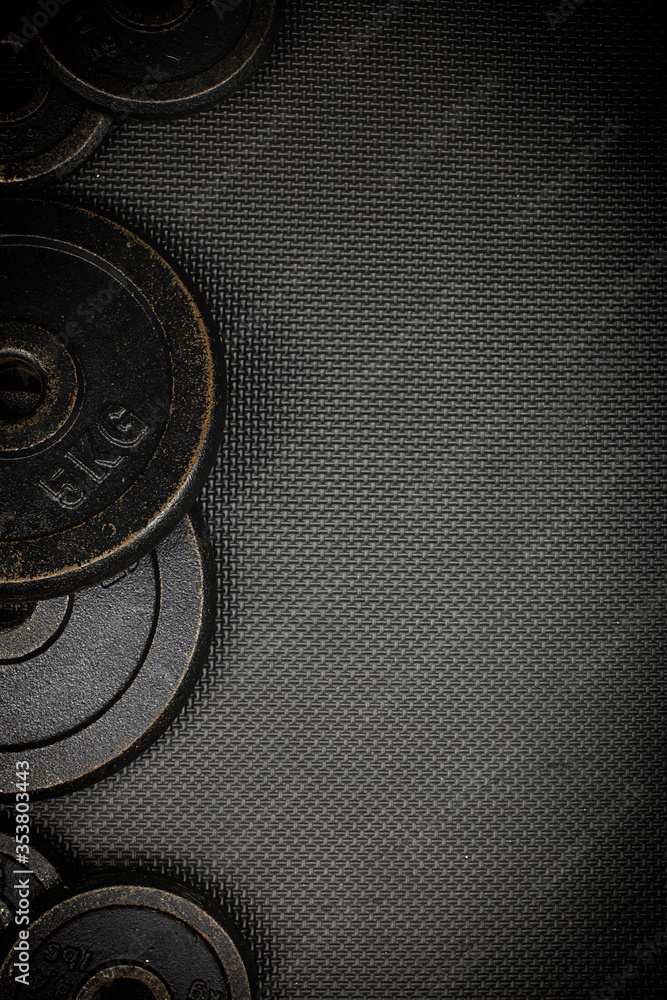 weight discs on mat Stock Photo | Adobe Stock
