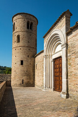 Wall Mural - italy, Marche, Corridonia, Church of San Claudio, front with central entrance, two towers on the sides,medieval church facade, view from below