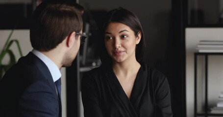 Poster - Diverse partners colleagues having business conversation in office. Male caucasian manager consulting female indian client at meeting. Young ethnic lady candidate talking to employer at job interview.