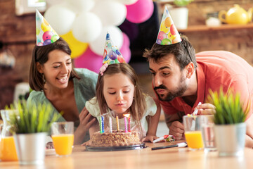 Family celebrating birthday together