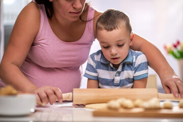 Poster - Mom and son have fun in the kitchen.