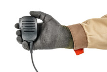Man Hand In Black Protective Glove And Brown Uniform Holding Walkie Talkie Handheld Microphone Isolated On White Background