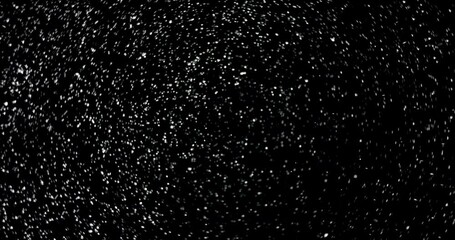 Wall Mural - cloud of dust particles floating in the air. the clip was shot on an isolated black background.