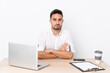 © luismolinero - Young business man with a mobile phone in a workplace sad