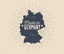 Made In Germany Badge Or Label Or Tag Design Template With Black Silhouette Of Germany Map With Sunburst Isolated On Light Background. Vintage Styled Vector Illustration
