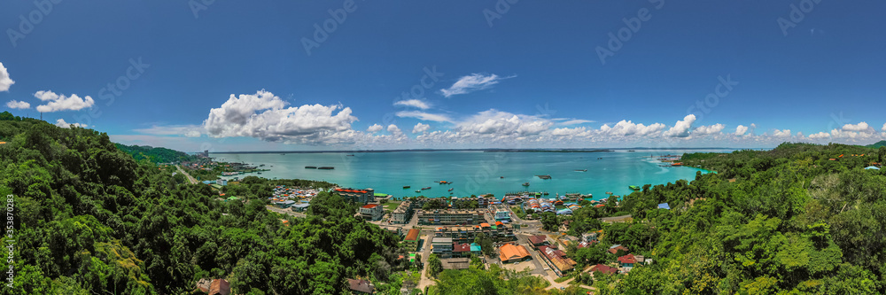 An aerial panorama view of Sandakan Town at Sabah. Sandakan is a city in the Malaysian state of Sabah, on the northeast coast of Borneo.