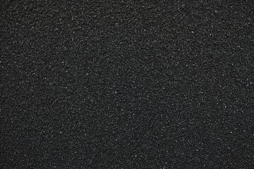 Wall Mural - Black Sand Wall Texture Background.