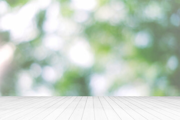 Wall Mural - abstract white wooden floor with beautiful bokeh in the garden background.