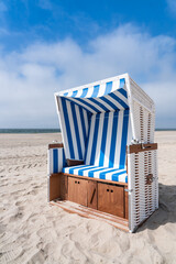 Wall Mural - beach chair near the north sea coast in germany