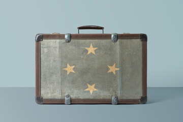 Wall Mural - Micronesia flag on old vintage leather suitcase with national concept. Retro brown luggage with copy space text.