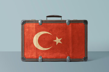 Wall Mural - Turkey flag on old vintage leather suitcase with national concept. Retro brown luggage with copy space text.