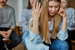 © Roman - stressful young girl talk about her problems connected with alcohol, caucasian female sit at fight meeting, solve alcoholism addiction