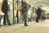 Fototapeta Miasto - crowd of people metro in motion blurred, abstract background urban traffic people