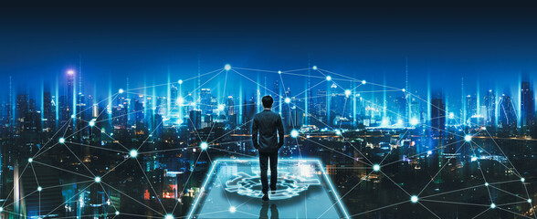 Wall Mural - Business man on future network city technology background